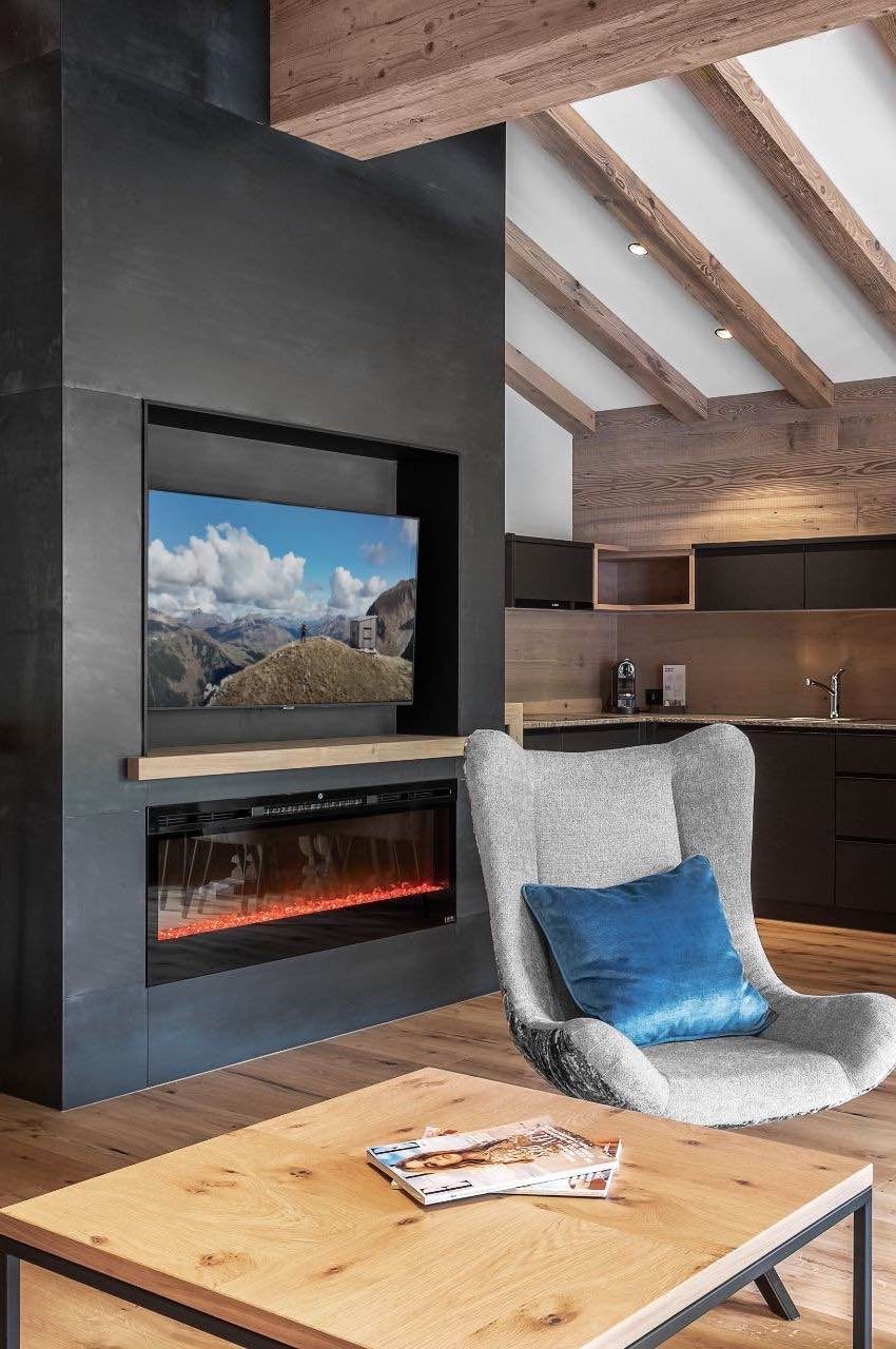 Arlberg Chalets in Österreich - traumhaftes Chalet mieten - für 4 Personen - 2 Schlafzimmer - großes Wohnzimmer mit offener Küche und Balkon